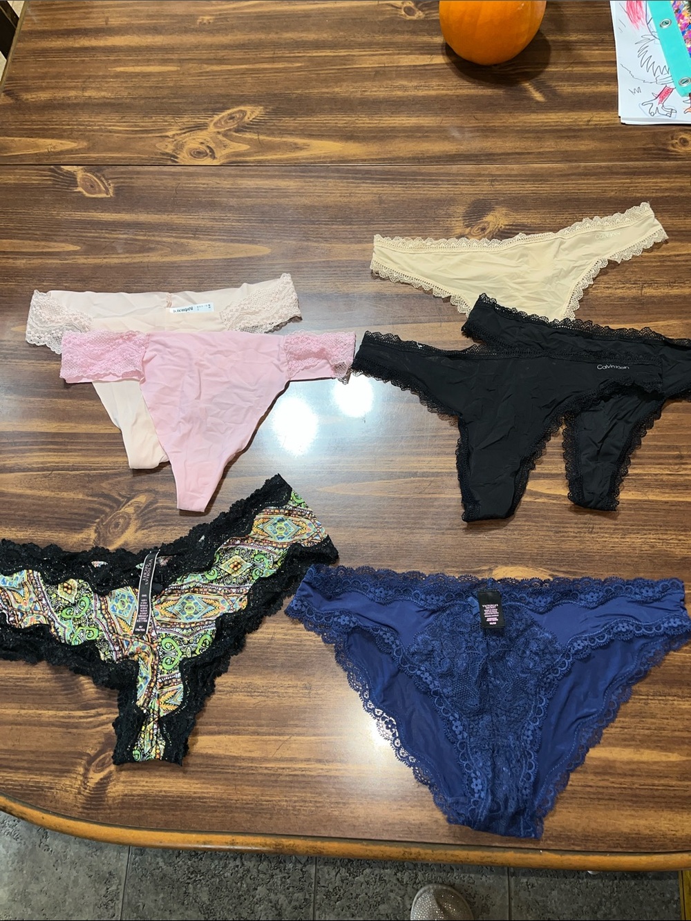7 totalAssorted medium styles of panties, VS, b. tempted & Calvin Klein